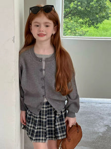 Sara's plaid skirt